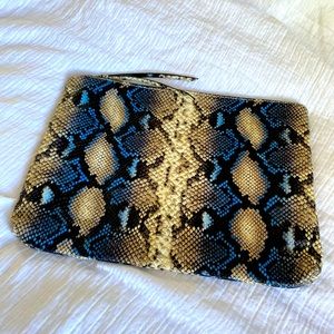 Large snake print clutch